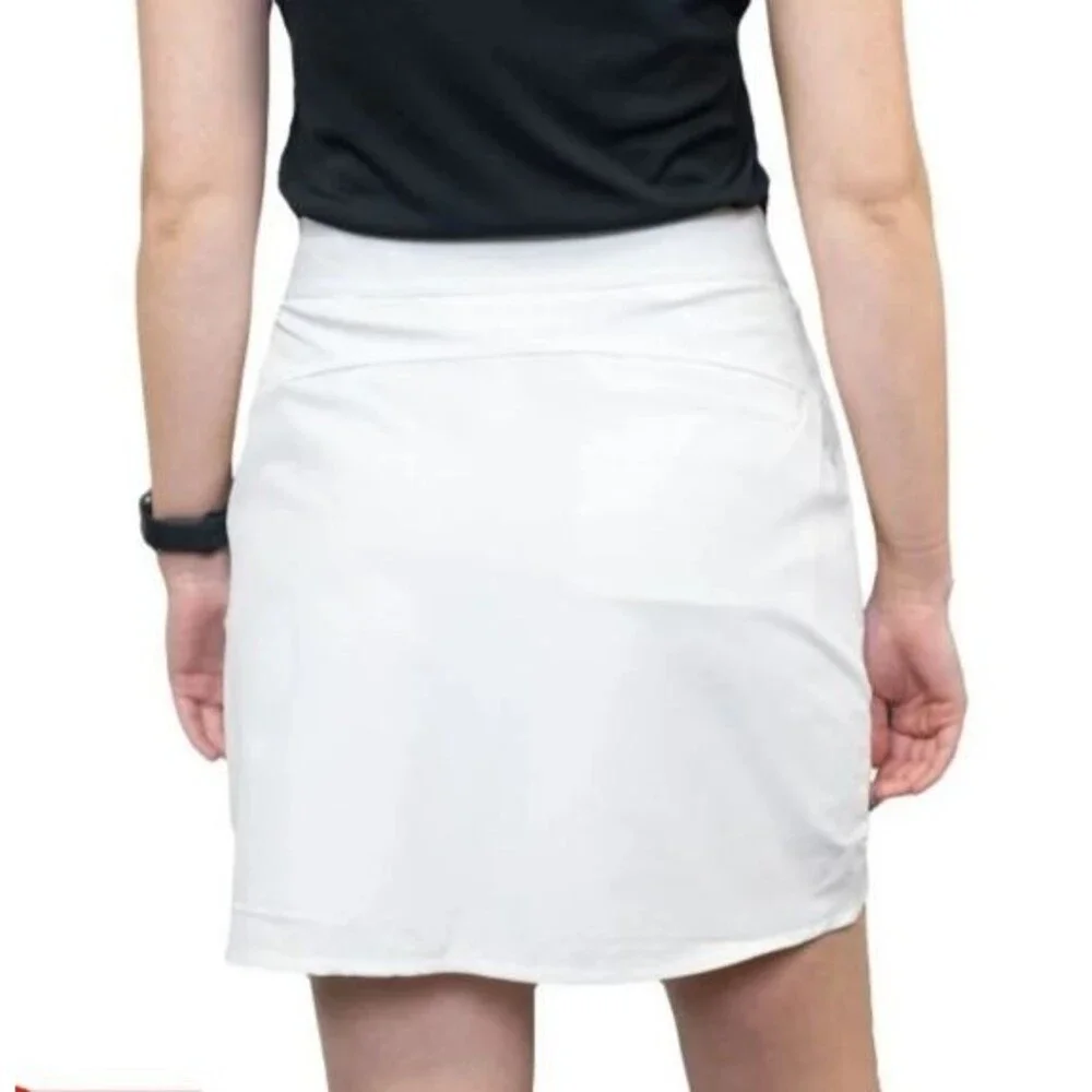 Greg Norman White Golf Skort Tennis Athletic Sz S UPF 30+ Stretch Pockets Preppy